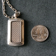 Illustration for article titled Lightning Review: Olinari Silver USB Dog Tags